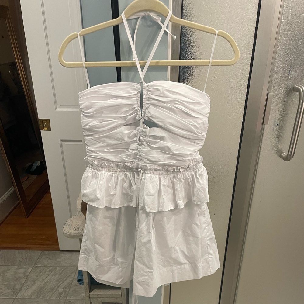 Olivaceous white halter tie romper with cutouts